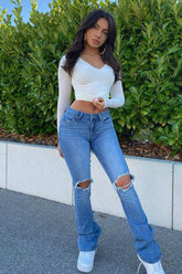 Jessie Mid Rise Distressed Bootcut Jean - Light Blue Wash Ins Street